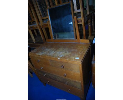A light Oak ex-ministry dressing chest with mirror.