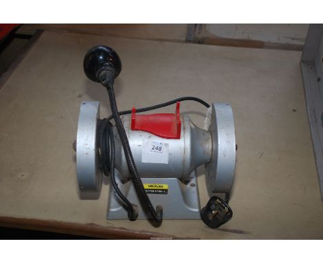 A bench polisher/grinder, 6'' wheels.