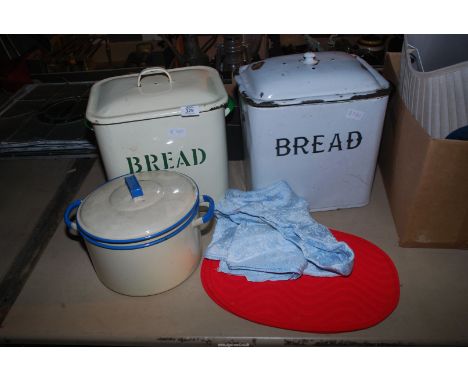 Two enamel bread bins and a stew pot.