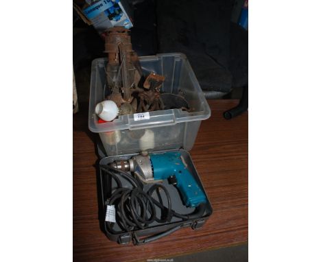 A Makita 240 electric drill, Tilley lamp and lamp parts and various other lamps.