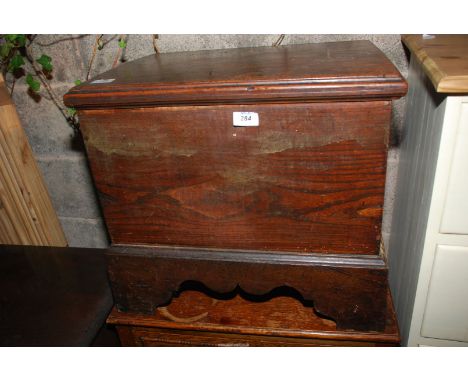 A small stained pine trunk, 21" x 15 1/2" x 19" high.