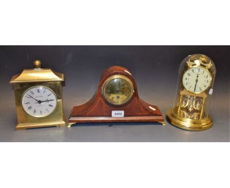 A Seth Thomas Quartzmatic mantel clock; others, Napoleon hat shape marked PHS, etc (3)
