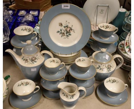 A Royal Doulton Rose Elegans dinner service, comprising eight dinner plates, side plates, soup bowls, cups, saucers, teapot a
