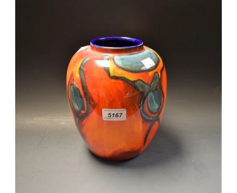 A Poole pottery ovoid vase, red, orange, blue glazed, cobalt blue interior 