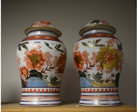 A pair of Chinese lidded jars, converted to lamp bases 