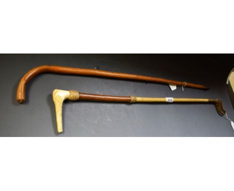 An Edwardian bamboo and leather riding crop, by C. Griffith, London, stag antler handle, 74cm long, c. 1910; walking stick (2