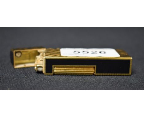 A Dunhill cigarette lighter, of Art Deco design