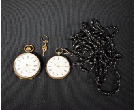 A silver open face pocket watch, Roman numerals, white enamel dial, on a long jet bead chain; another 800 grade silver open f