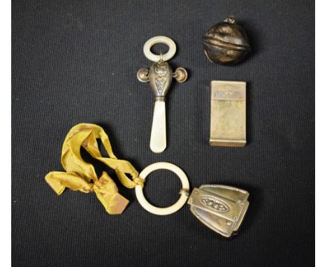 An early 20th century silver bell; an early  20th century silver and mother of pearl teething rattle; Gilette razors case; EP