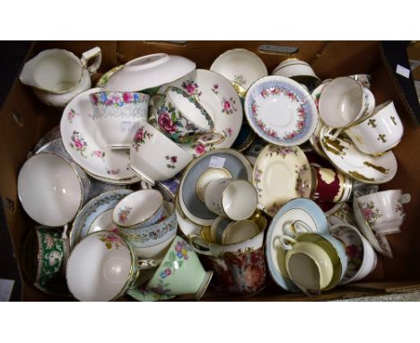 An Aynsley teacup and saucer; another Foley teacup and saucer, c.1920; other assorted Staffordshire harlequin teacups and sau