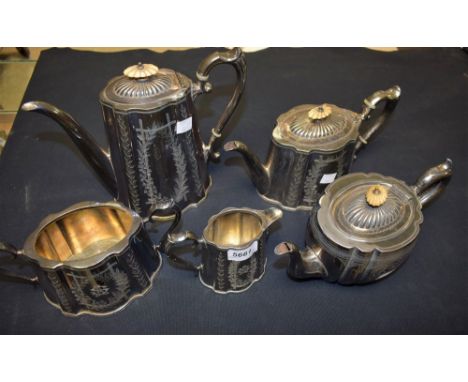 A four piece plated tea and coffee set and a teapot (5)