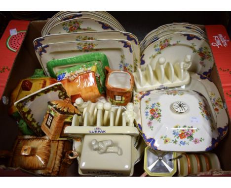 A Staffordshire floral printed dinner service; a Staffordshire fruit set; cottage ware teapot, butter dish, toast rack; Lurpa