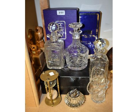 An Edinburgh crystal decanter, boxed; another; a Thomas Webb crystal decanter, boxed; a Ronson table lighter; a brass mounted