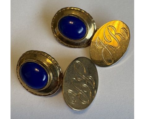 A pair of 9 carat cufflinks. Approx. 4 grams. Est. £120 - £150.
