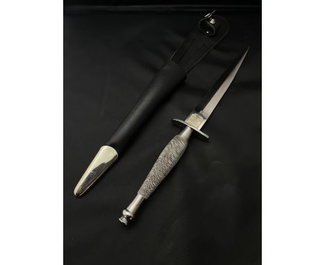 A Fairbairn Sykes Royal Marine Commando presentation knife pattern 1 type with  appropriate scabbard etched to one side with 