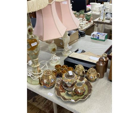 A job lot of assorted collectibles including Japanese tea service, Onyx table lamps etc, shipping unavailable