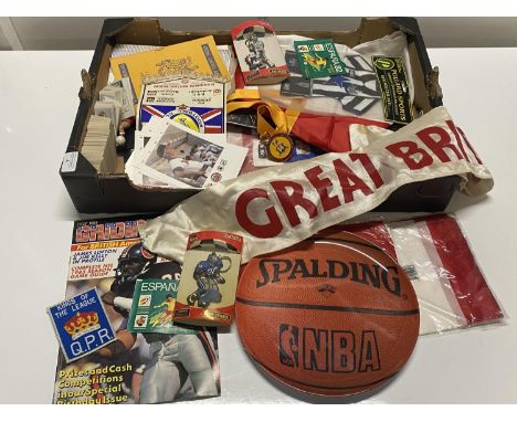 A selection of football memorabilia including Leeds United programmes, 1975 European Cup Pennant and other