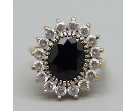 A 9ct gold cluster ring set with an approximately 1.78ct sapphire and white stones, 5.1g, L 