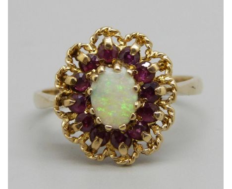 A 9ct gold, opal and ruby cluster ring, 3.3g, R, opal chipped 