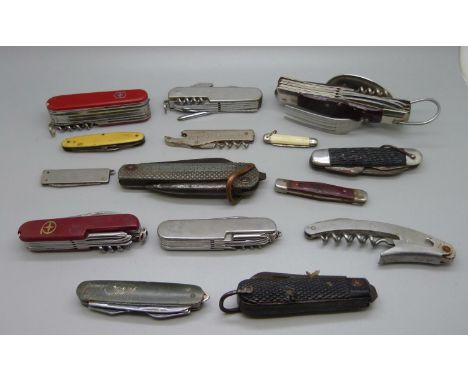 A collection of fifteen pocket knives including two WWII and Swiss Army 