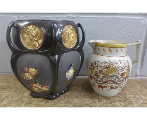 A 19th Century creamware Harvest jug, a/f, and a Bretby enamel vase 