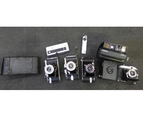 A collection of cameras including Polaroid and folding and spy camera (9) 