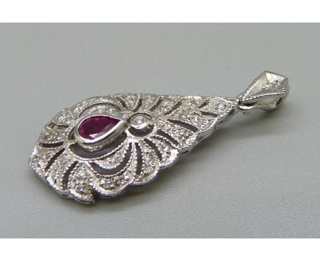 An 18ct white gold ruby and diamond pendant, 3.9g, 32mm 