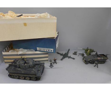 Three boxes of plastic German army soldiers, tank and field gun 