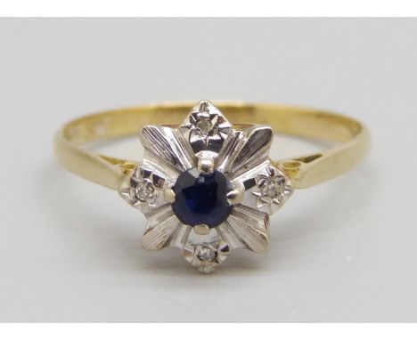 A sapphire and diamond cluster ring, marked 750, 2g, P 