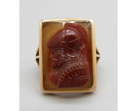 A 9ct gold carved ring depicting a Roman Centurion, 7.3g, N, 15mm x 20mm 