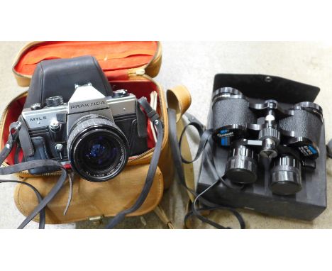 A Tamron film camera, a Weston Master III light meter and a pair of binoculars