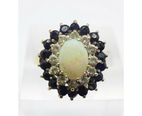 A 9ct gold, opal, sapphire and white stone ring, 4g, R