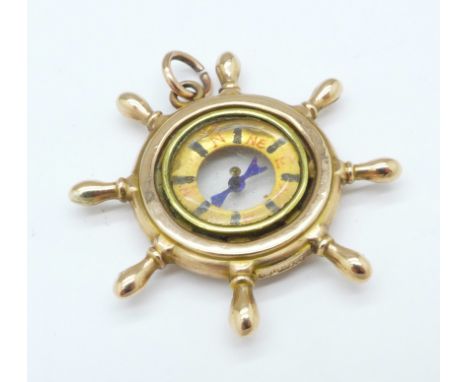 A 9ct gold ship's wheel compass fob