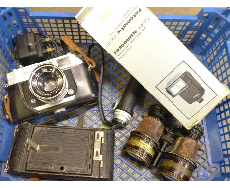 A Konica auto 52 camera, a Kodak folding camera, a Fotomatic 600STZ light gun and stand and a pair of field glasses