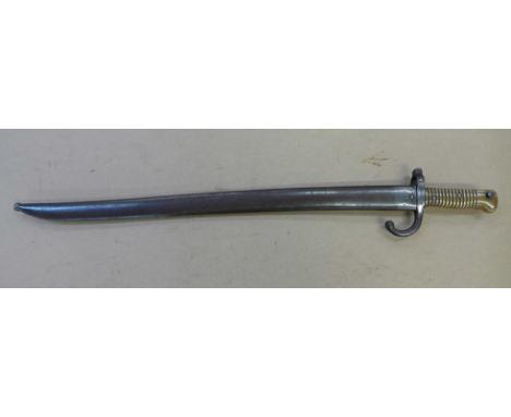 A French M1866 Yataghan sword bayonet and scabbard, made at St Etienne in August 1870, bayonet and scabbard have matching ser