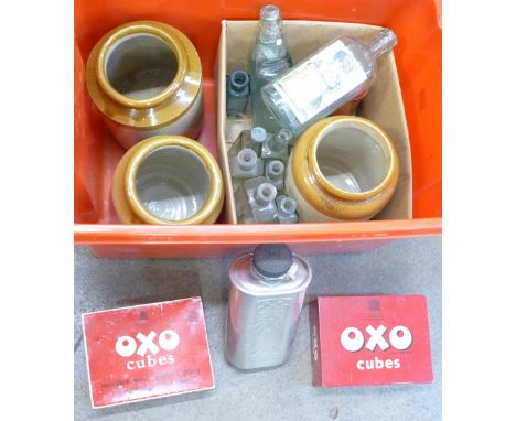 Two Oxo tins, three stoneware jars, glass bottles and an aluminium water flask