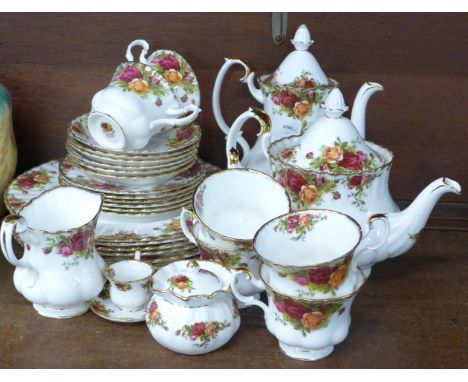 A Royal Albert Old Country Roses six setting tea service, one cup with hairline crack, six dinner plates and a coffee pot