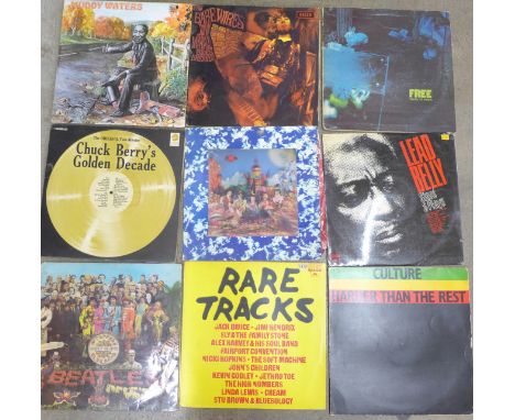 LP records including The Rolling Stones, The Beatles, Muddy Waters, Free and Chuck Berry