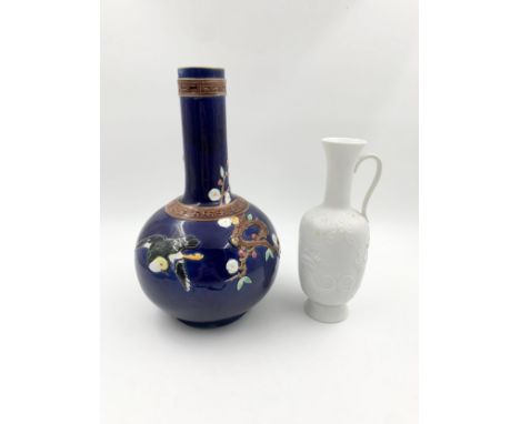 A Chinese ceramic vase and another marked Kaiser, Germany. H.32cm (largest)