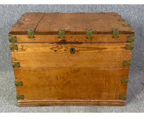 A 19th century pine and metal bound trunk. H.55 W.75 D.53cm