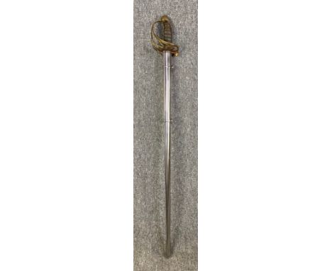A 19th century steel and brass officer's dress sword with scabbard. L.99cm