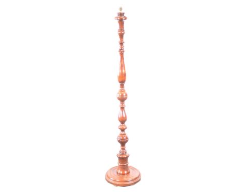 Mahogany standard lamp, turned column, circular base, 147cm.