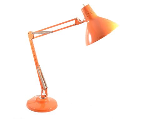 A 1960's orange angle poise lamp by 1001 Lamps London.