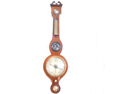 A Victorian mahogany five dial mahogany barometer, swan-neck pediment, silvered charts, unsigned, 97cm.