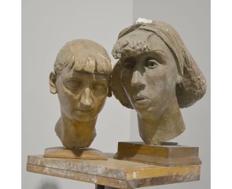 Mary Milner Dickens, 'Yvonne', two female busts, plaster with patinated finish, on shaped wooden stands, height 33cm and 39cm