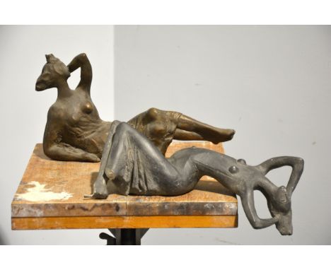 Mary Milner Dickens, Reclining female figures, two sculptural studies, plaster with bronzed patina, 39cm x 20cm, and 34cm x 2