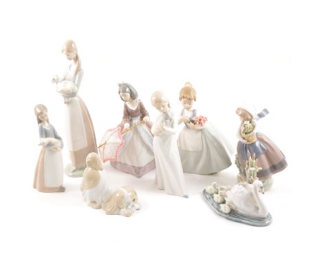 Lladro figure, Girl with a parasol, 21cm; another Lladro figure, Girl with a plant pot; two others, Girl with a kid, Girl wit