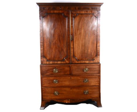 George III mahogany linen press, adapted as a wardrobe, dentil cornice, plain frieze, two panelled doors to the upper section