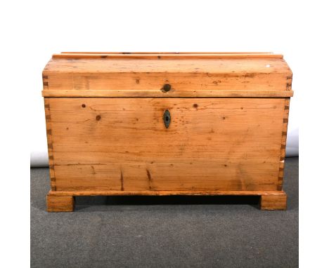 Dutch pine trunk, domed top, tapering sides, block feet, width 101cm, depth 59cm, height 67cm.