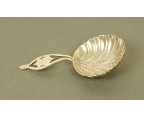 A Victorian silver caddy spoon by Frederick Elkington, for Elkington & Co, with leaf moulded circular bowl and pierced termin